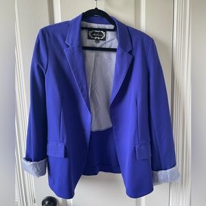 Royal blue fitted blazer, size large. Used, good condition.
